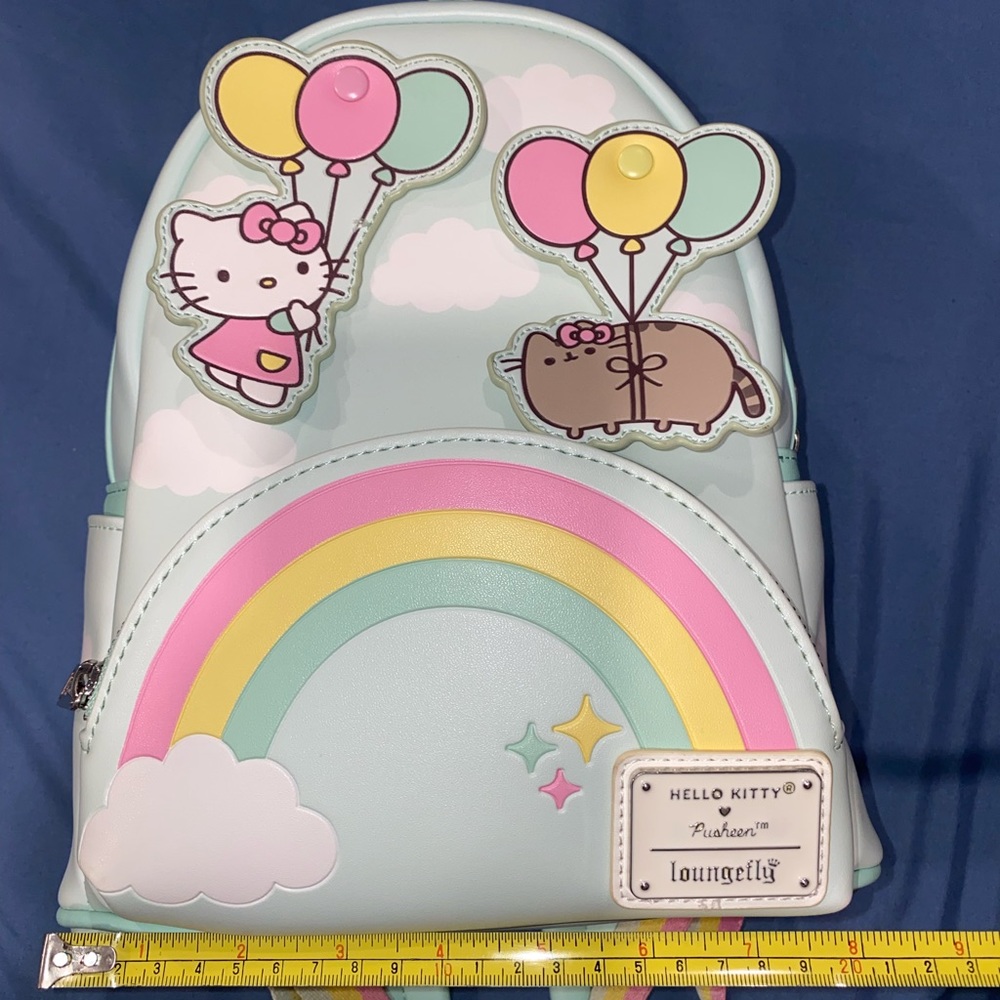 Hello kitty x Pusheen loungefly mini backpack with matching wallet